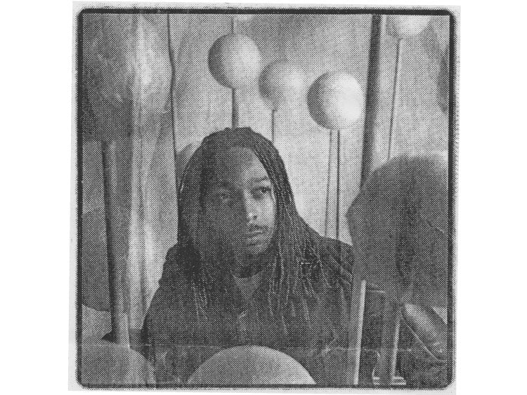 Detroit native and African-American fashion designer Maurice Malone poses for an Detroit Free Press interview when at age 33, tells his story.