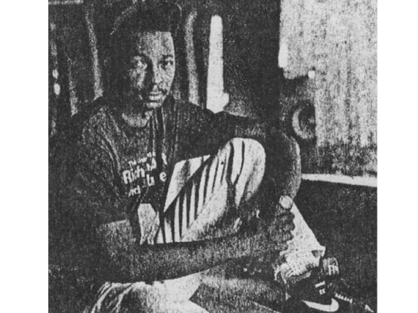1989 photo of 25-year old African American fashion designer Maurice Malone in his youth posing for the Detroit Free Press new paper interview