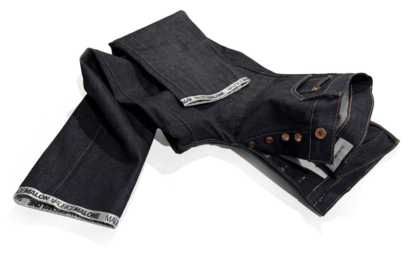 Maurice Malone's Slim Basic Raw Denim Jeans are meticulously crafted in the USA from premium 15-oz Japanese Selvedge denim, designed to offer durability and a refined fit.