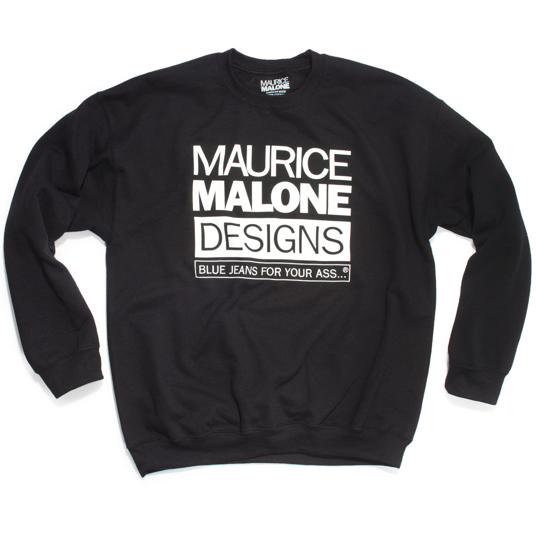 90s hip-hop style in its purest form: black fleece crew with bold white 'Maurice Malone Designs Blue Jeans For Your Ass' logo, epitomizing iconic 90s streetwear, recreated for 2024.