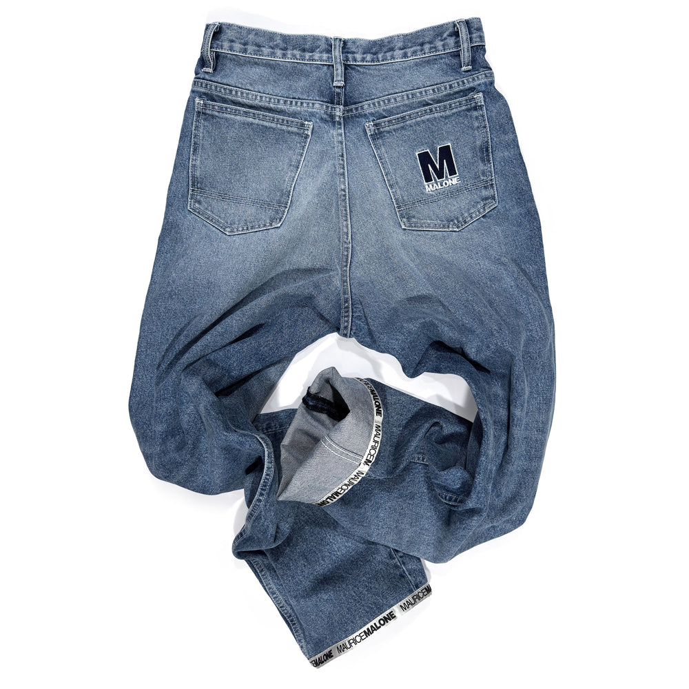 Rear view of Maurice Malone 1998-BR jeans showing tonal rear pocket logo, Logo Cuff hem, and recreated 90s baggy fit.