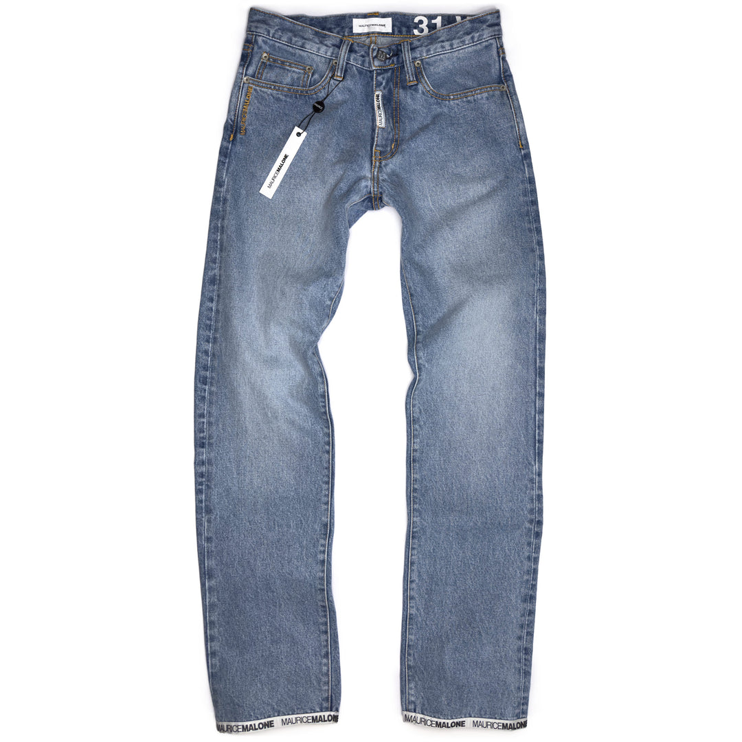 Full front of Maurice Malone 2026 Logo Cuff jeans in light stonewash, showing modern straight-leg fit and logo tape cuff branding.