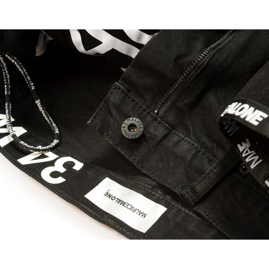 Inside jean details feature branded hanger loops, pocket bags and soft heat applied satin waistband label.